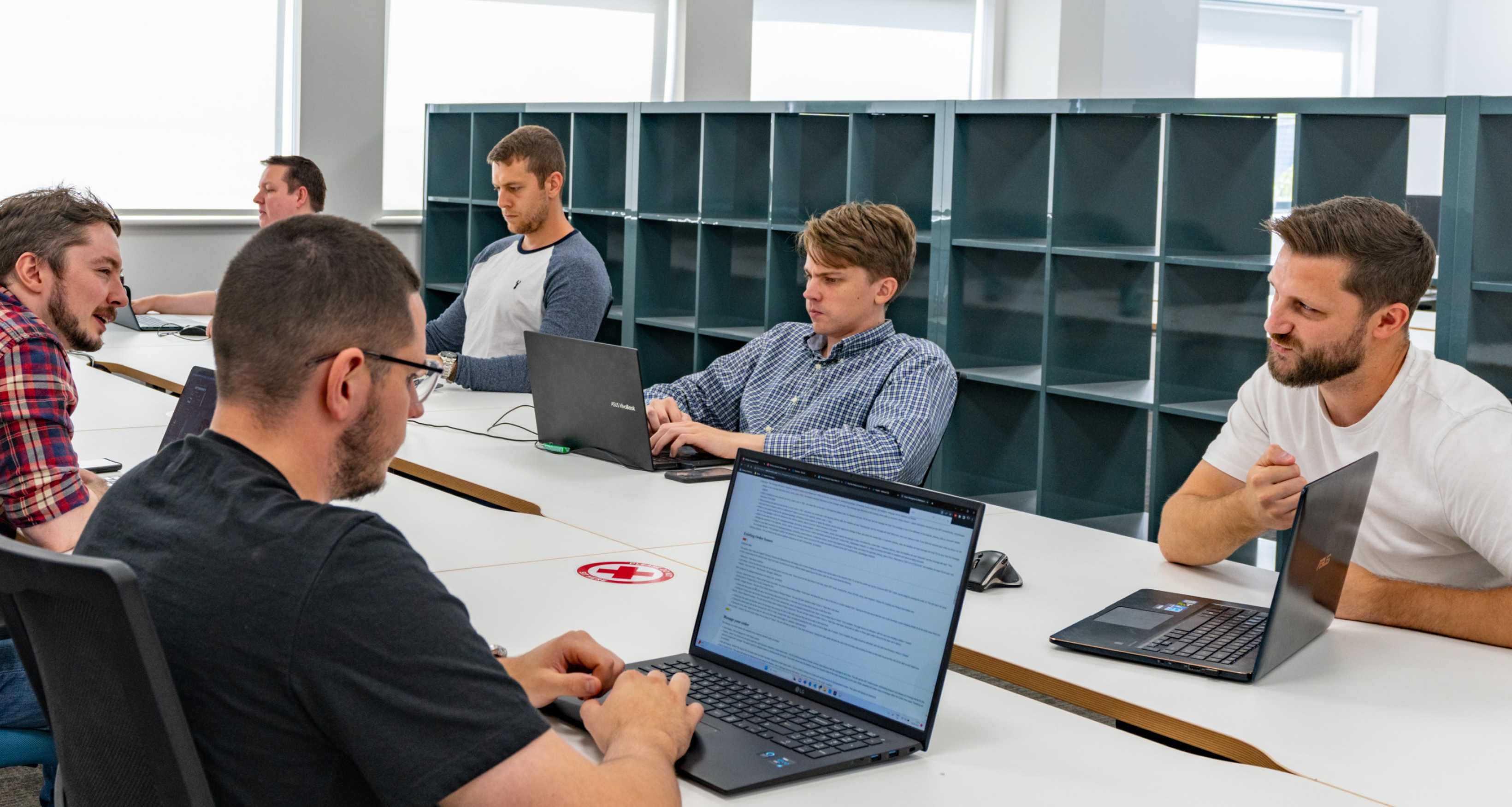 Image of Austin Waddecar and team in Office-1