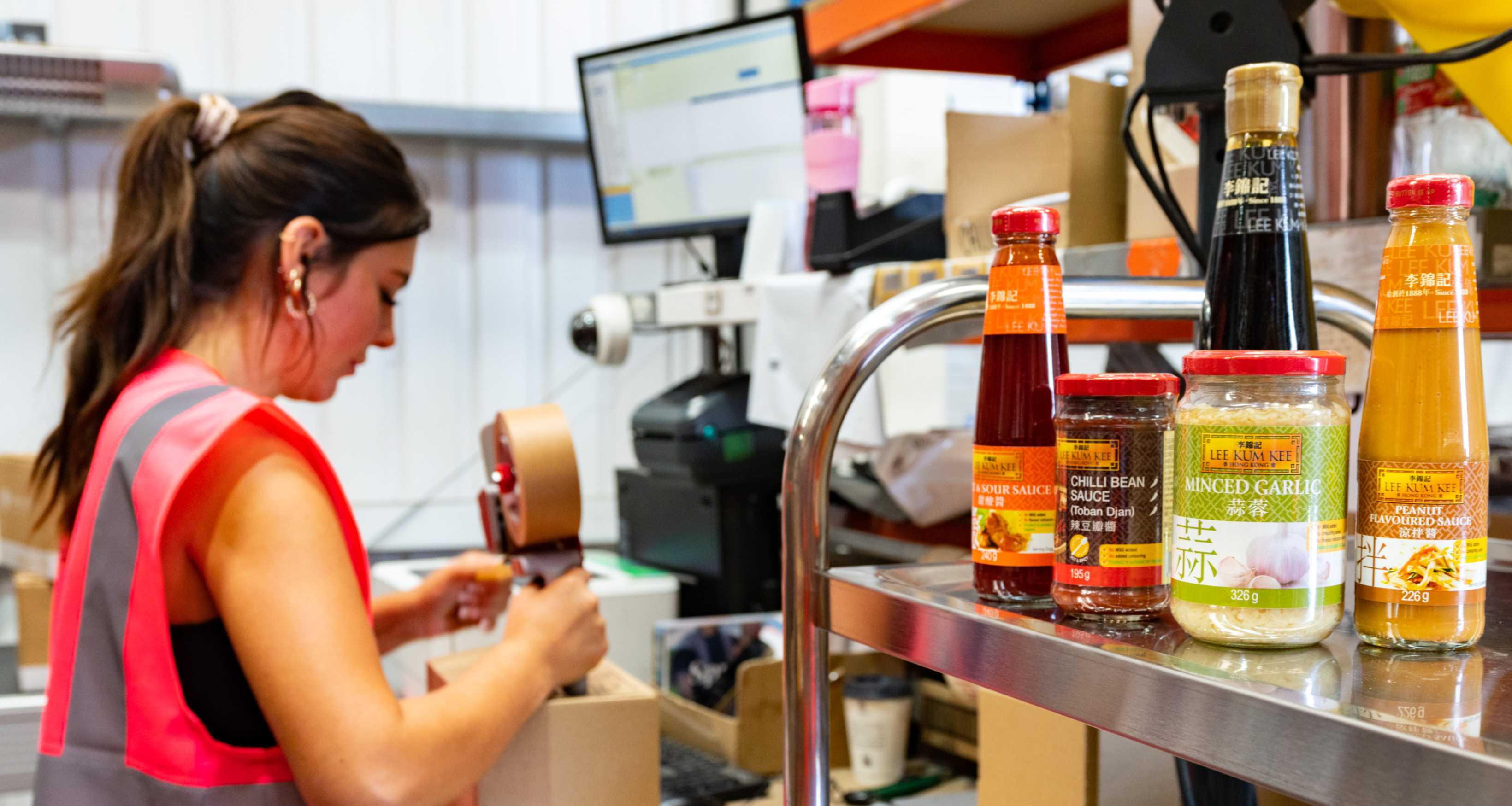 Image of Lee Kum Kee products being packed